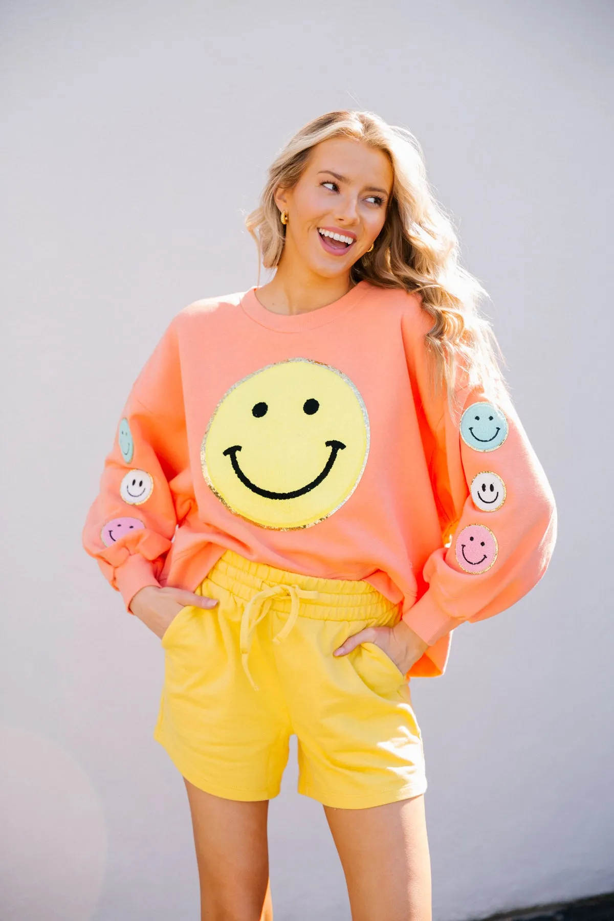 SMILEY DAYS ORANGE PULLOVER
